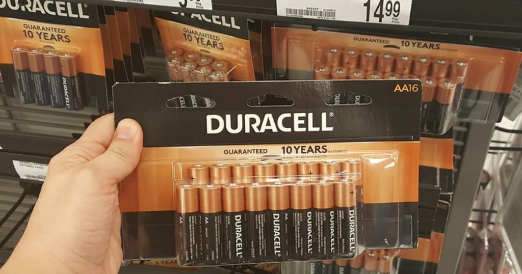 hand holding duracell 16 count AA batteries office depot in store