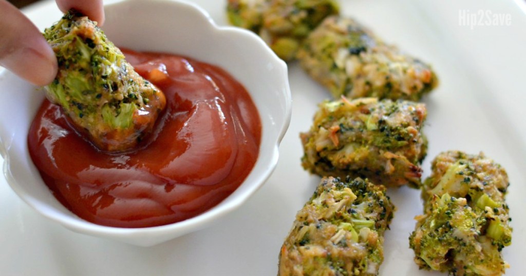 putting broccoli tot in ketchup