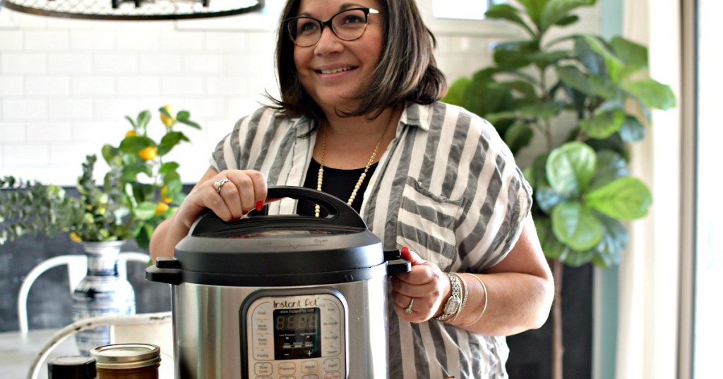 woman with an instant pot on the counter