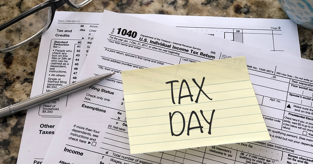 sticky that reads "Tax Day" on a 1040