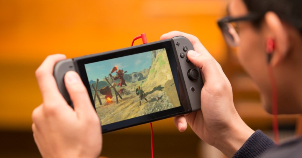 person playing zelda on nintendo switch