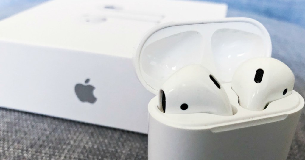 Apple Airpods next to box