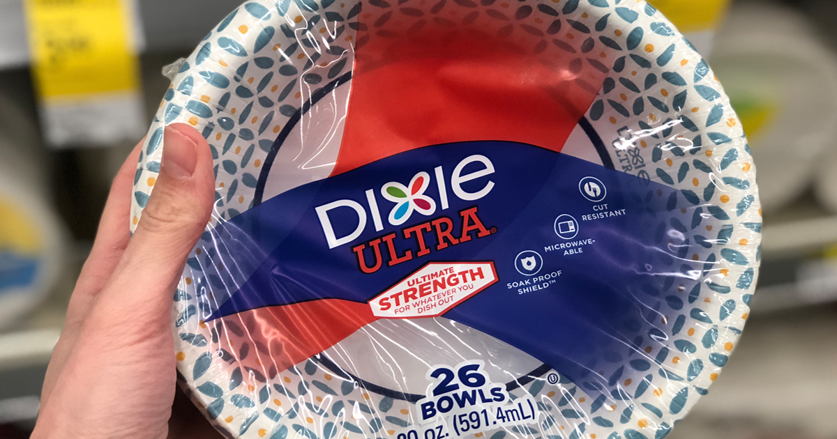 hand holding package of dixie paper bowls