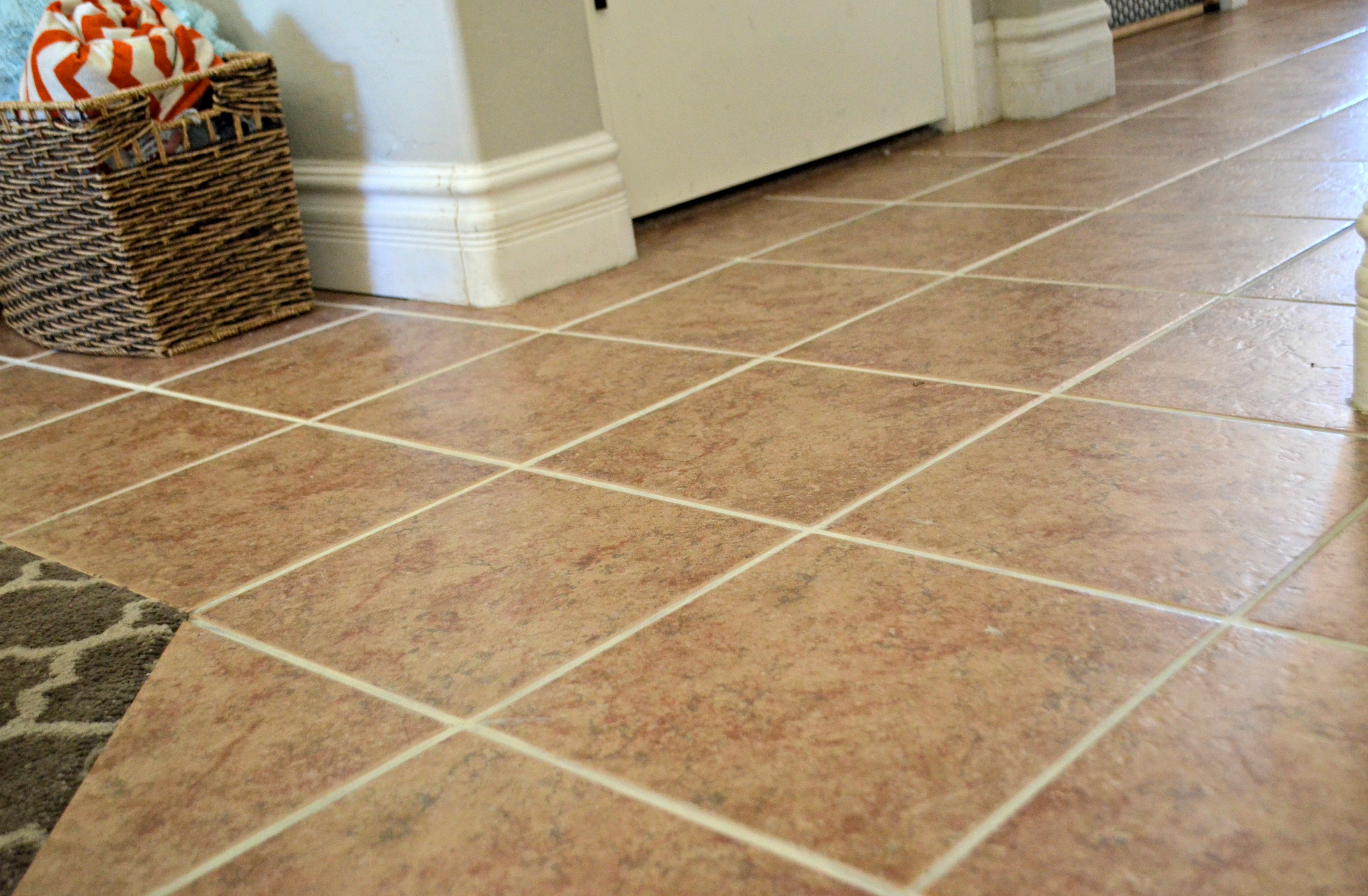 closeup of the tile floor after cleaning the grout