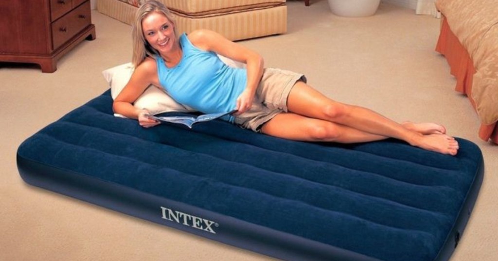 woman laying on an inflatable air mattress
