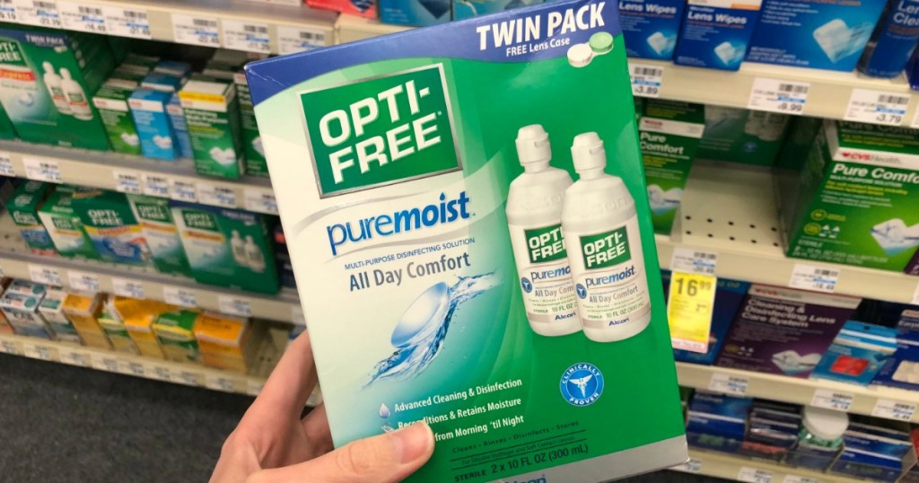 hand holding opti free contact solution multipack