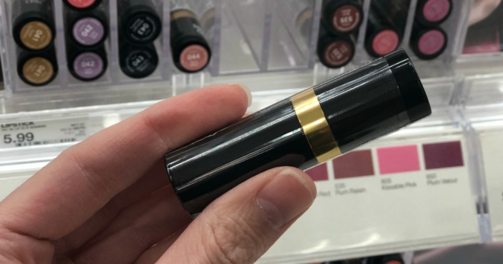 hand holding revlon super lustrous lipstick at target