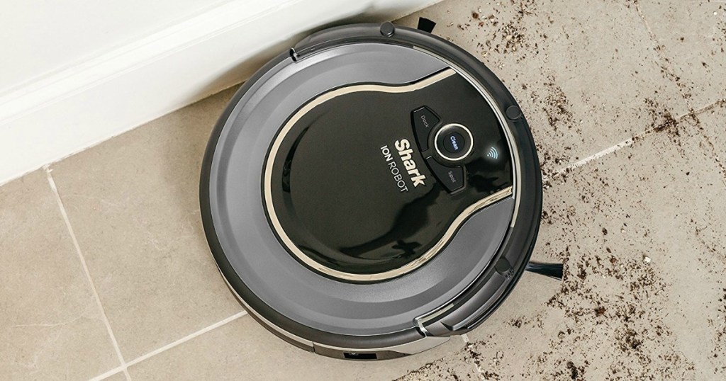 Shark ION Robot Vacuum Cleaning System with Detachable Hand Vacuum in a kitchen floor
