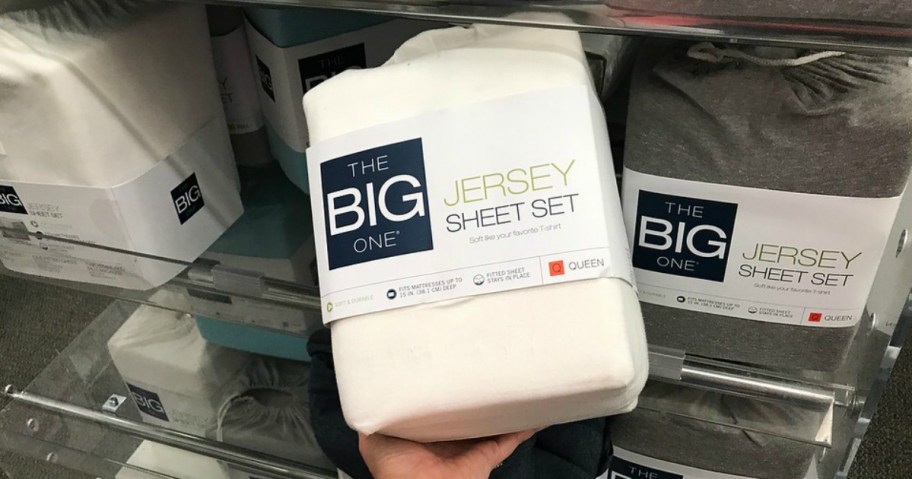 hand holding a set of The Big One Jersey Sheets at Kohls
