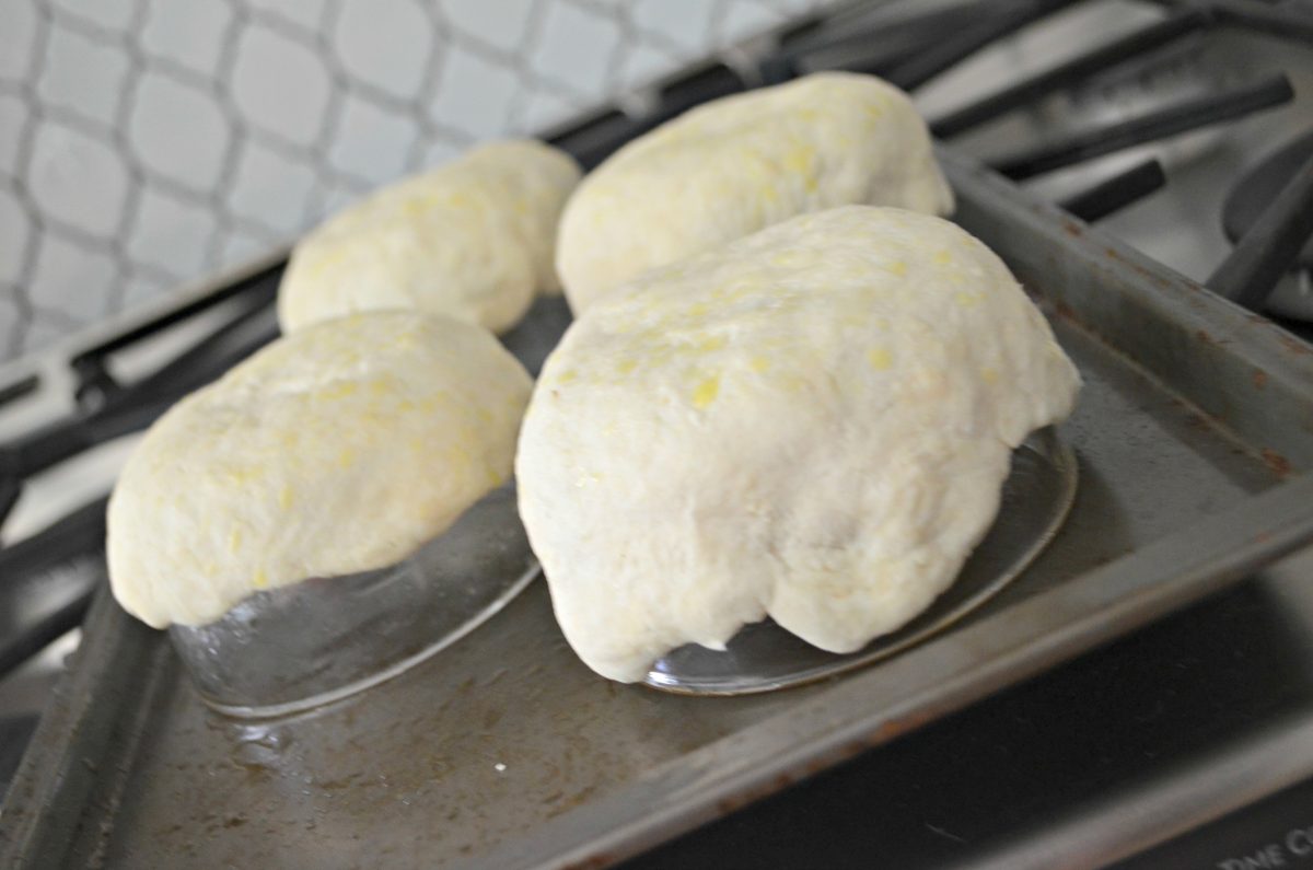 Draping the dough over inverted bowls or muffin pans before baking gives them their shape.