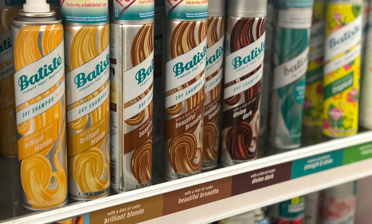 row of batiste hint of color dry shampoo on store shelf 
