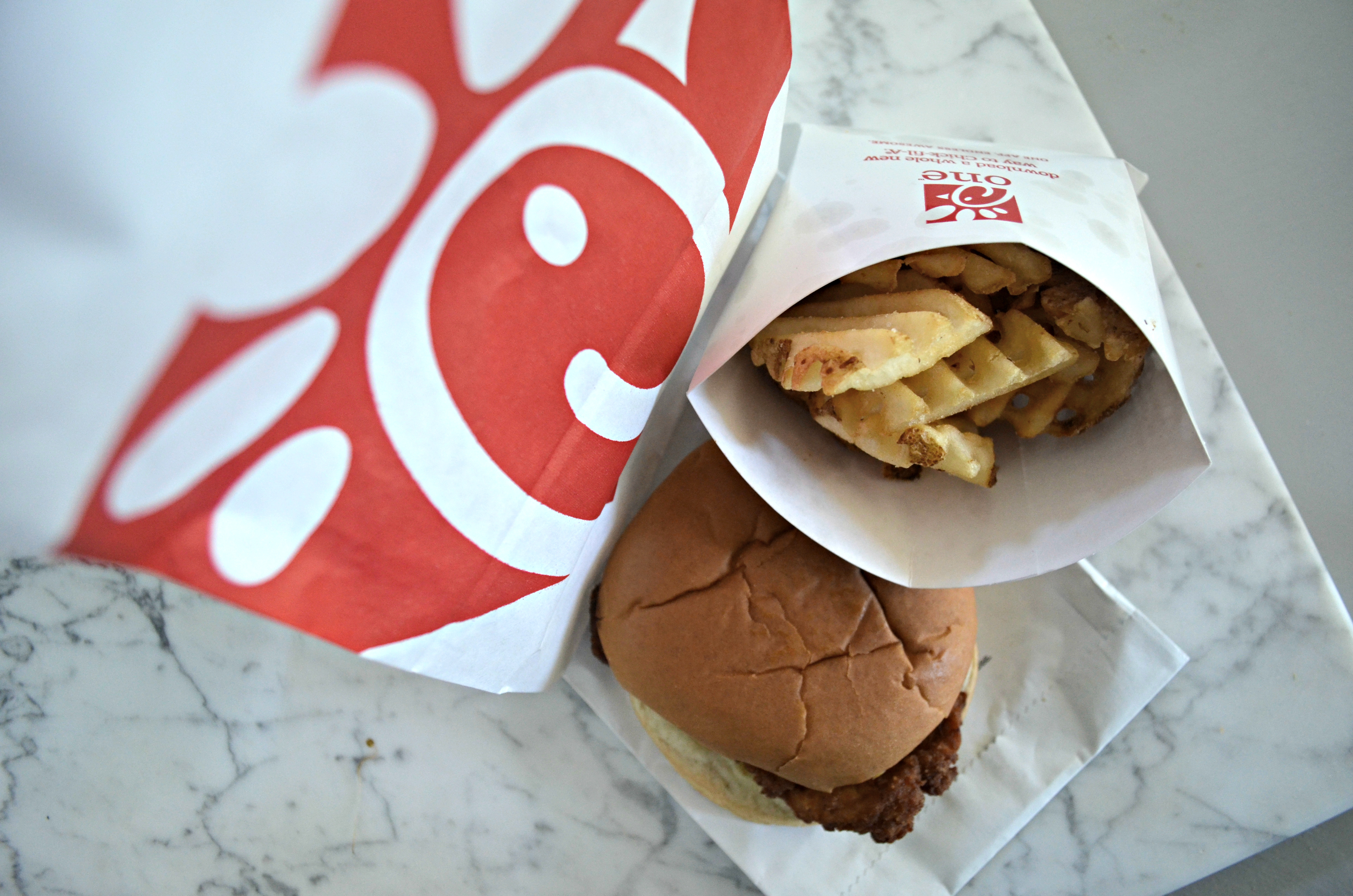 Get Chick-fil-A free nuggets through the app - A Chick-fil-A burger and fries