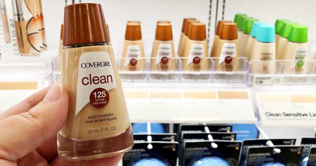hand holding Covergirl foundation