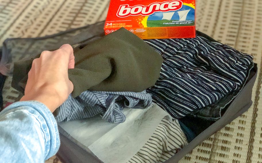 use dryer sheets to keep clothes smelling fresh travel packing hacks