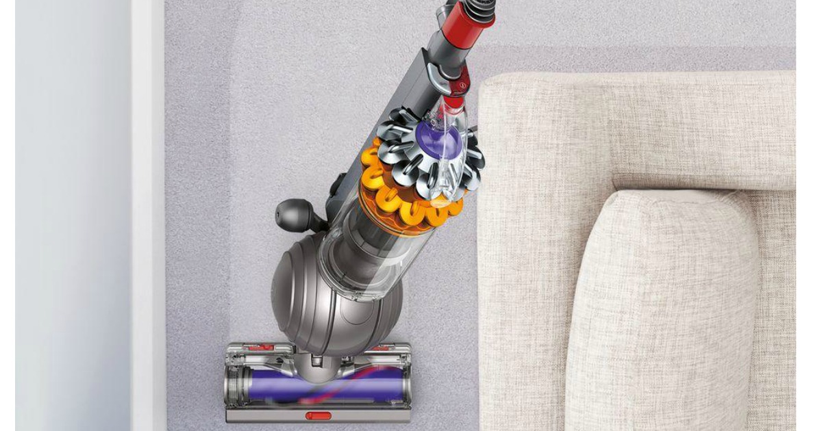 Dyson Small Ball Vacuum going around couch