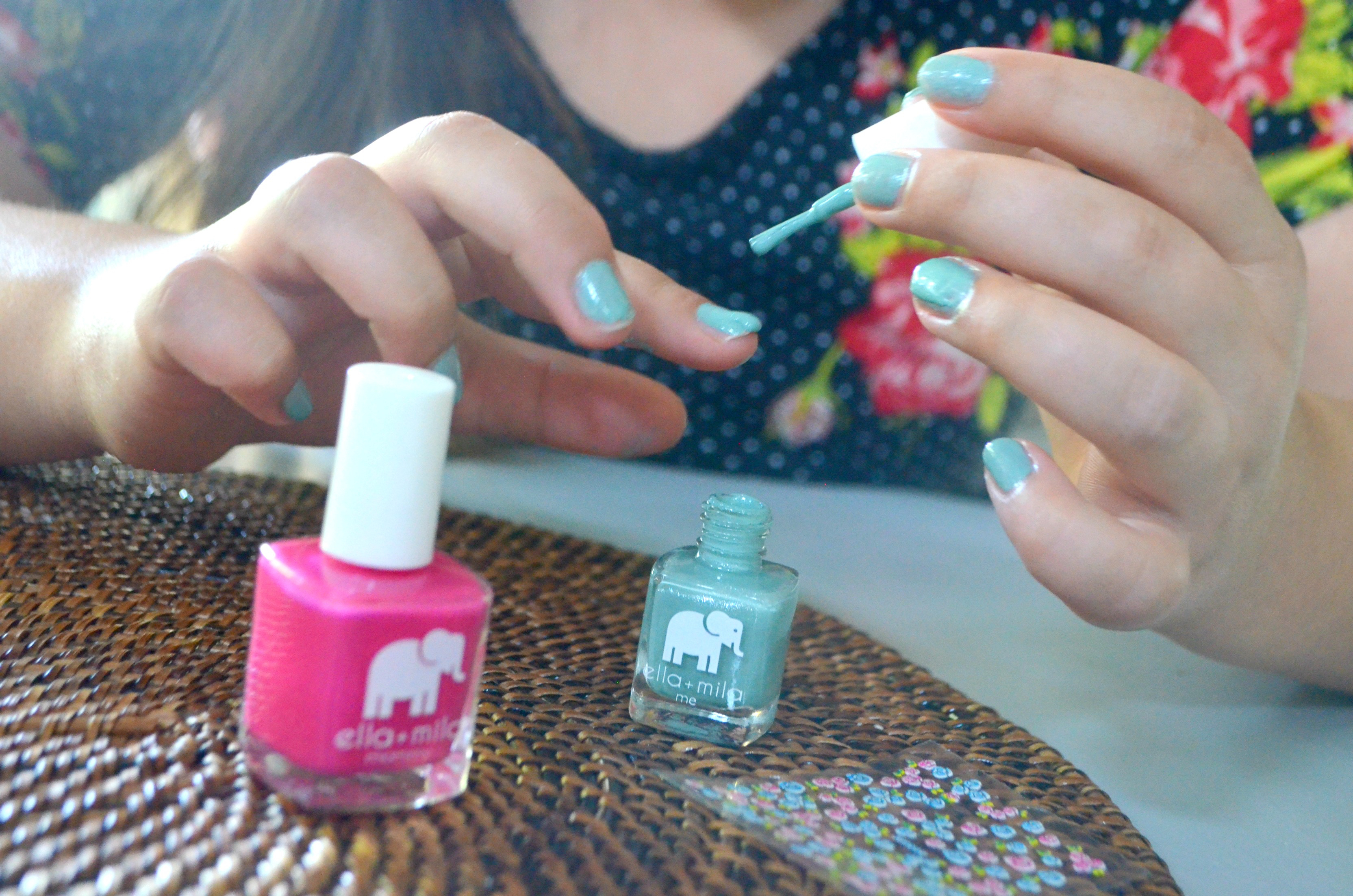 ella mila nail products deal - young girl painting her nails