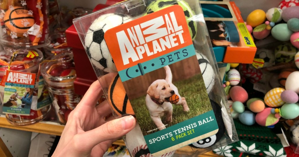 hand holding animal planet pets toys