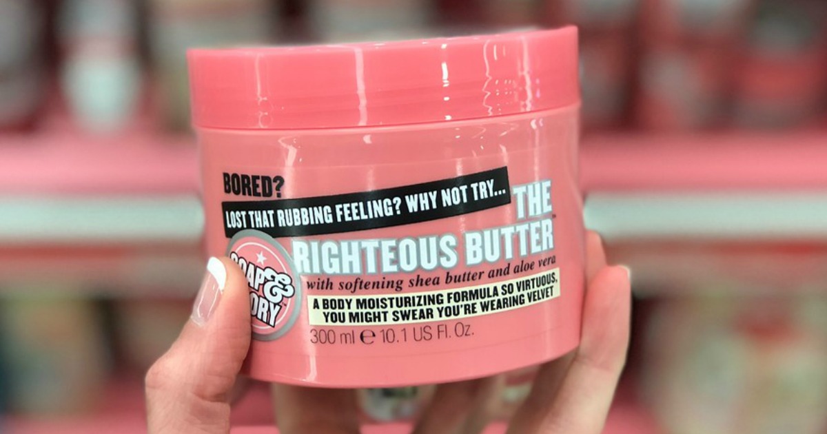 hand holding Soap & Glory The Righteous Butter 10.1oz