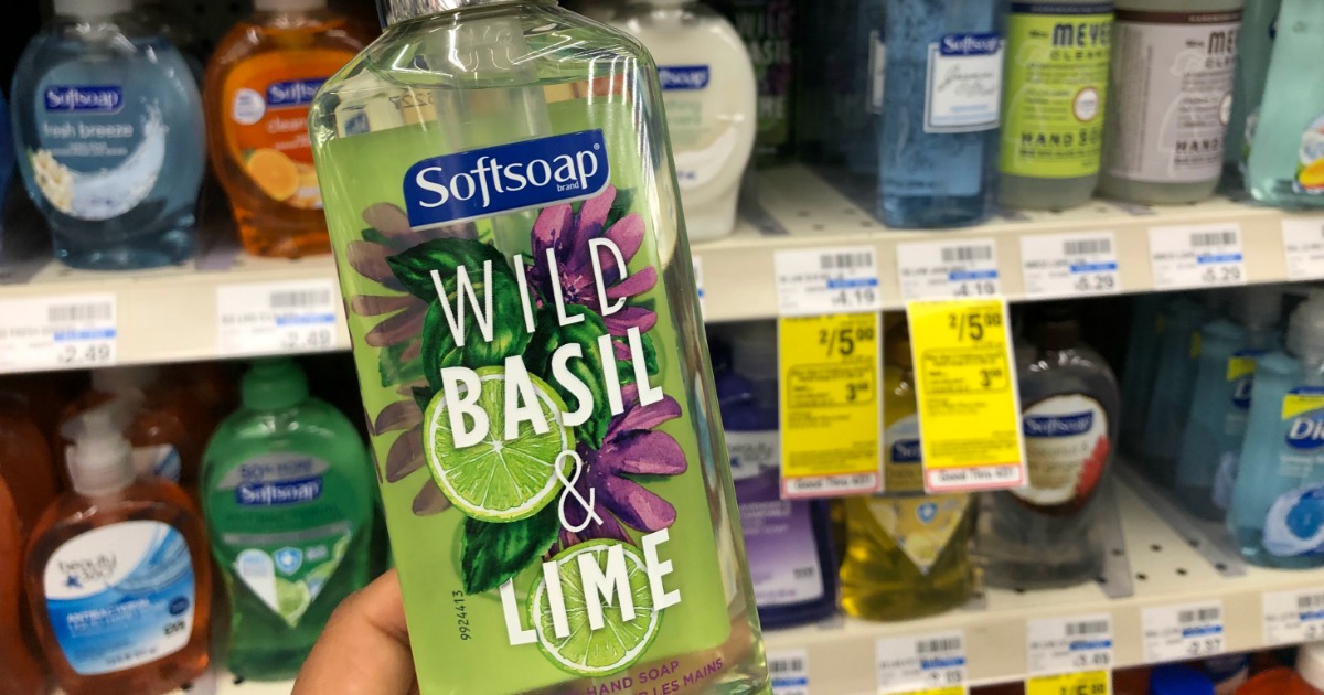 hand holding up a bottle of soft soap in store
