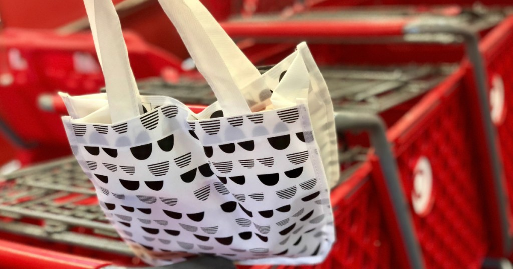 shopping bag and red shopping cart