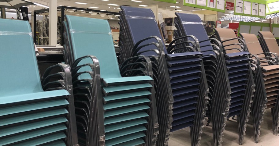 patio chairs stacked in a store