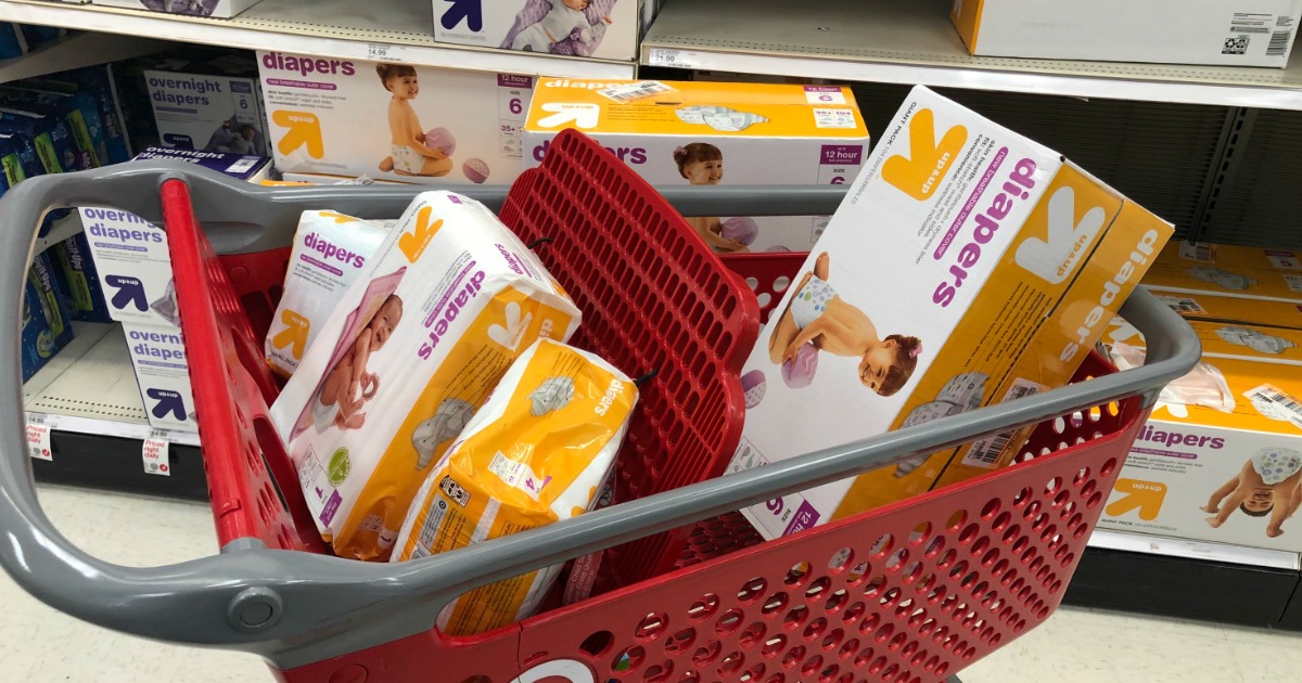 boxes of diapers in red target shopping cart