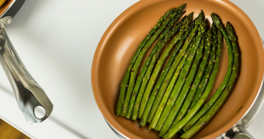 copper pan with asparagus
