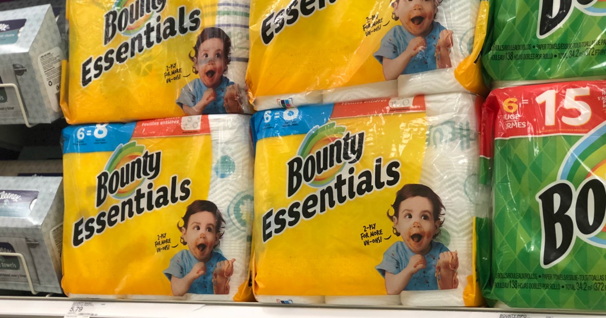 packages of paper towels on a store shelf
