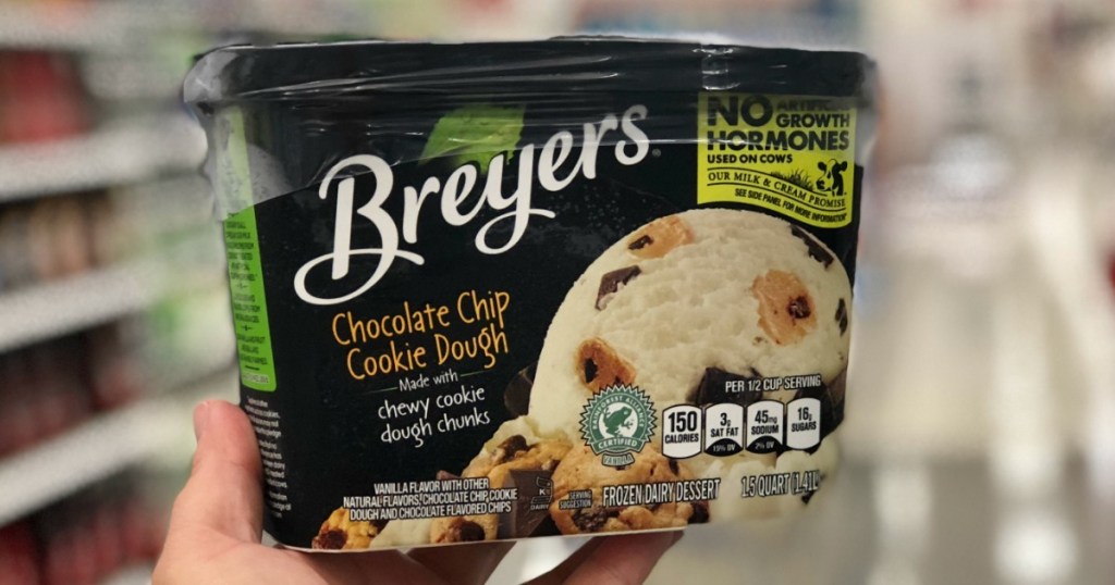 hand holding breyers ice cream