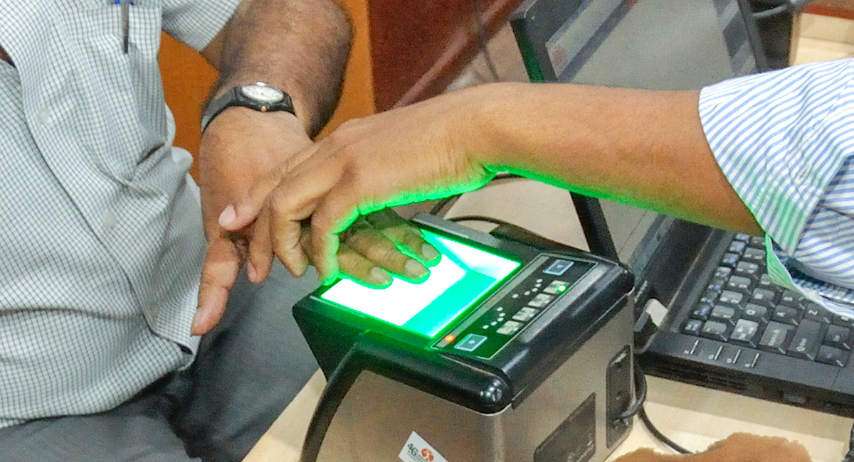 holding hand over fingerprint scanner