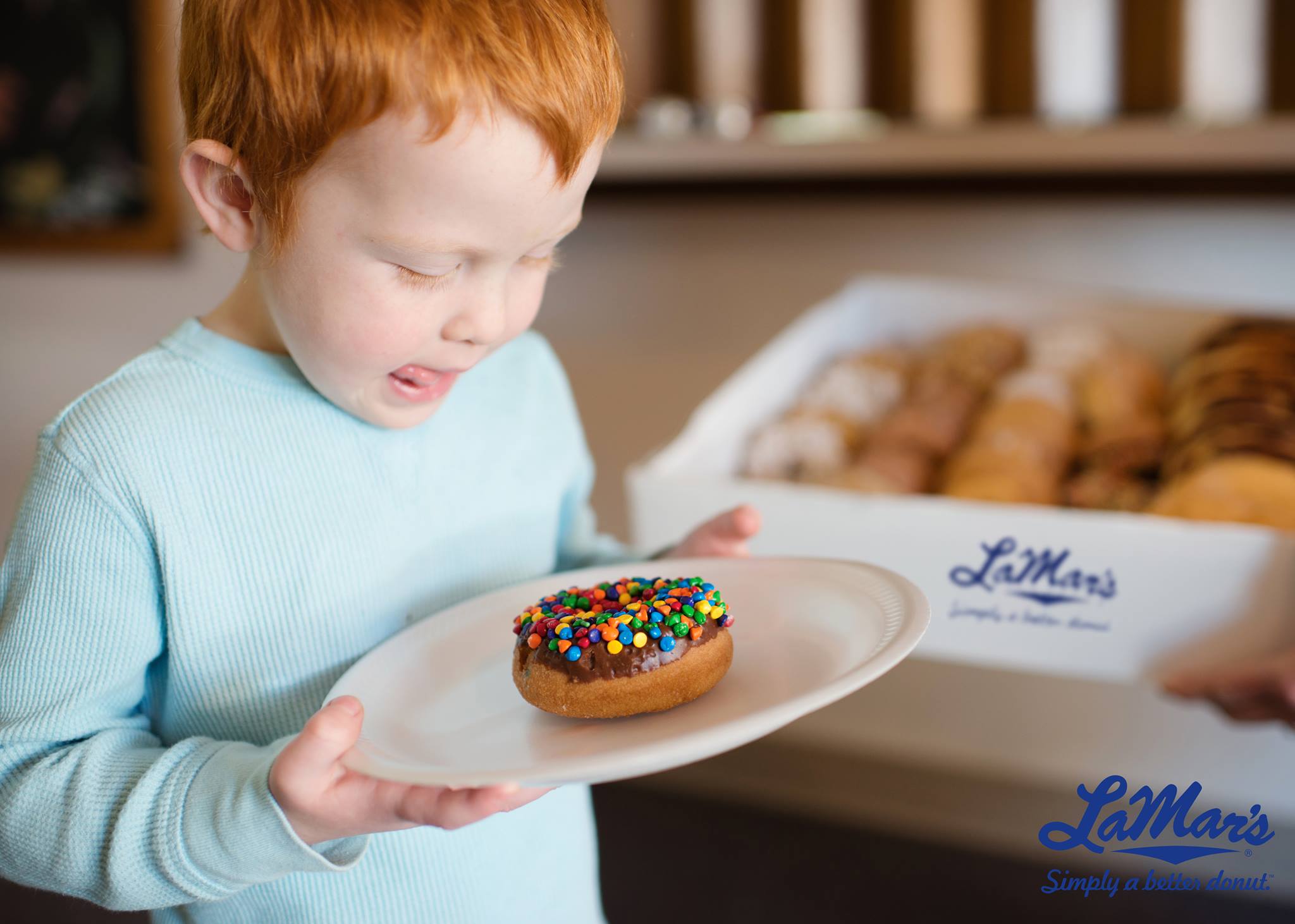 2018 national doughnut day freebies – child with lamar's donut