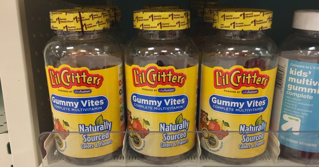 three bottles of kids gummy vitamins on shelf