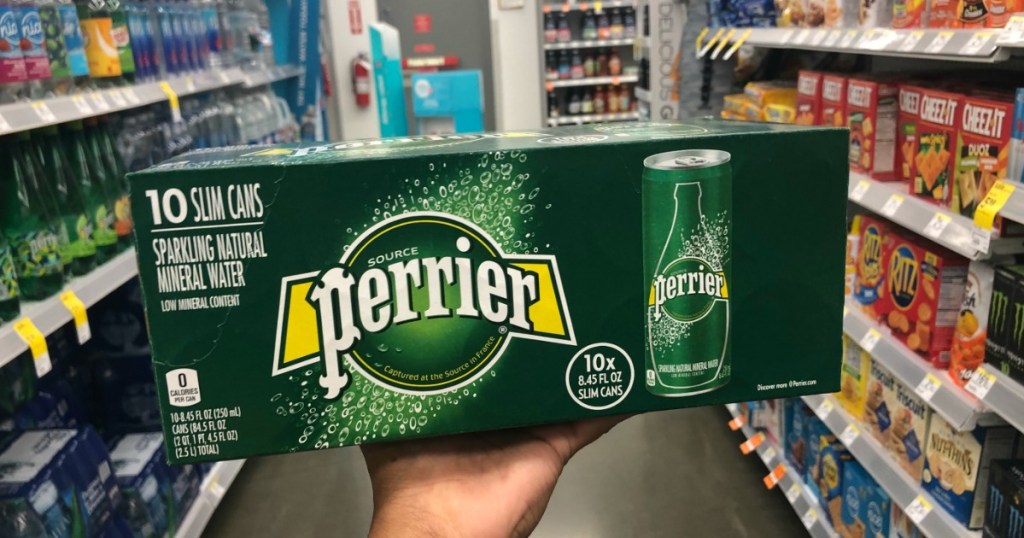 hand holding perrier