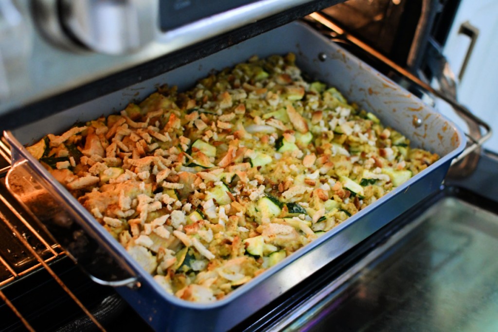 9x13 pan with chicken zucchini casserole in the oven