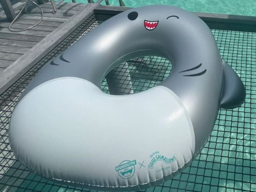 Squishmallows 5' Shark Pool Float floating in pool