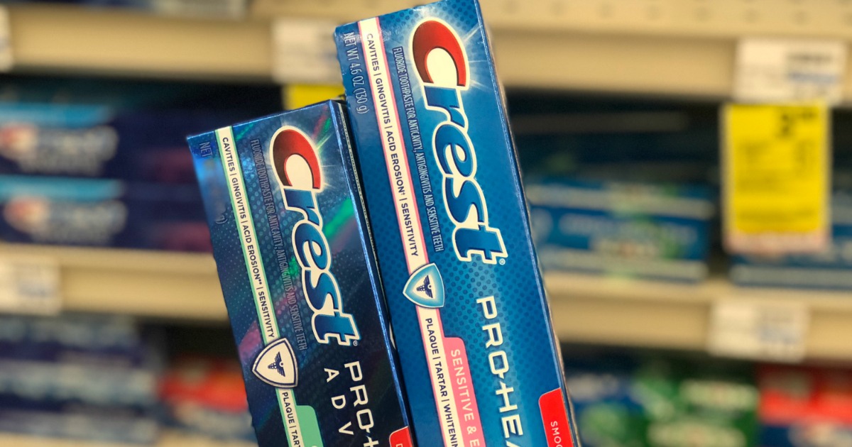 Crest toothpaste in front of shelf 