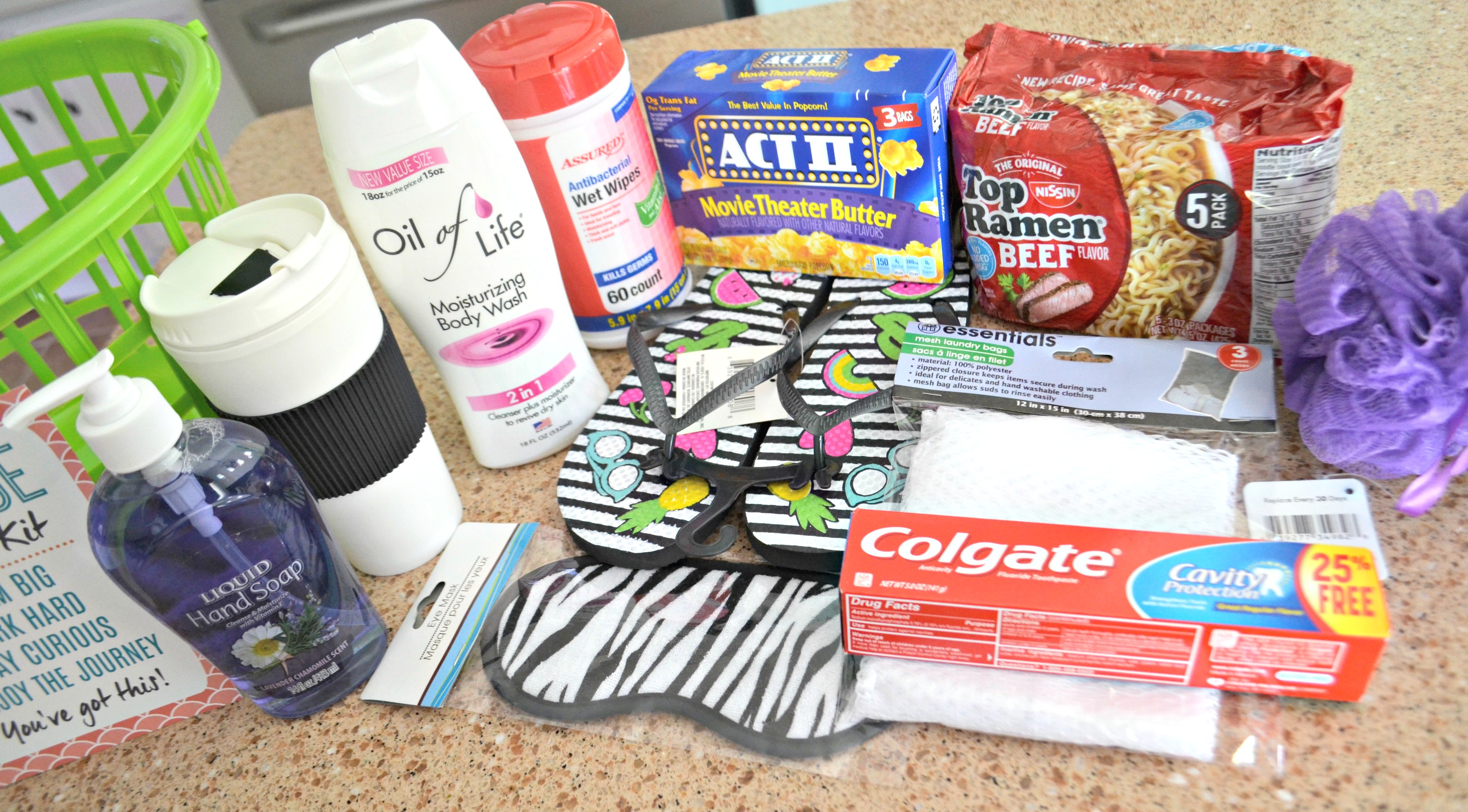 Dollar Tree DIY College Survival Kit with Printable plus items on a table for the basket