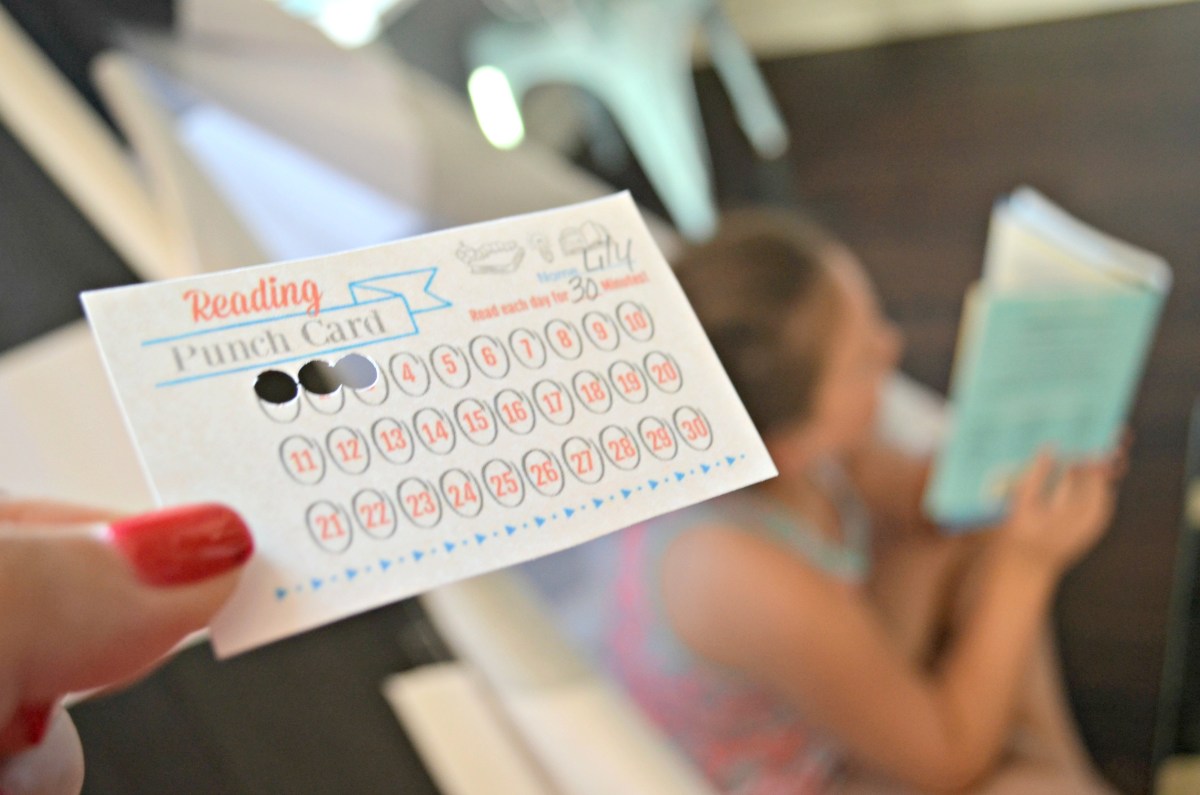 hand holding reading punch card