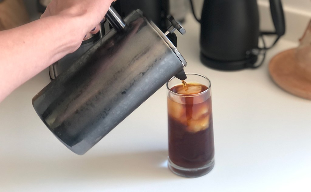 pouring french press cold brew