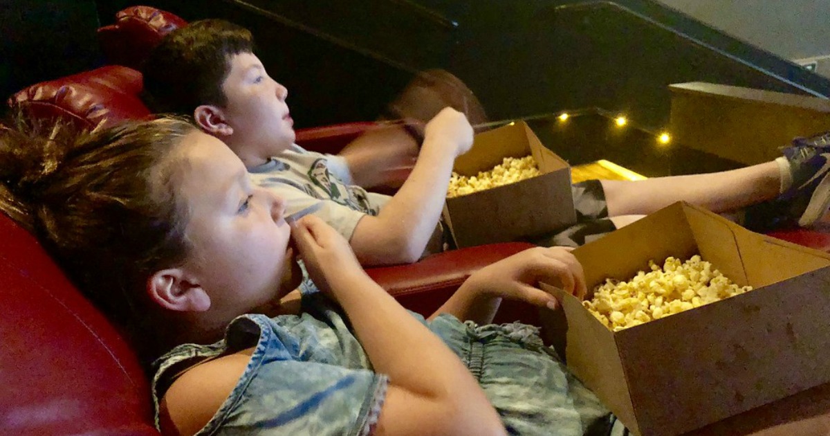 eating popcorn at the movies