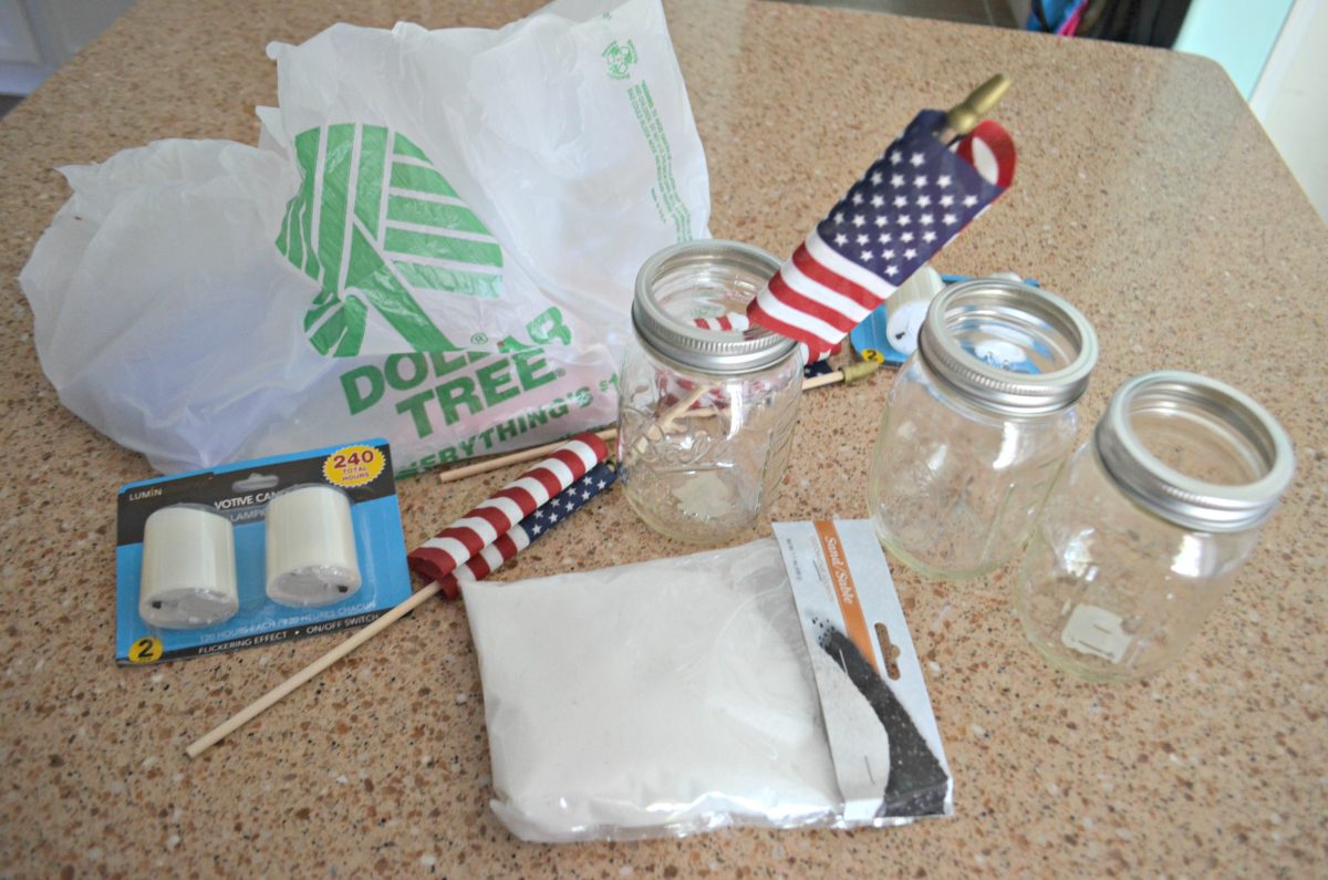 Dollar Tree 4th of July Craft Mason Jar Votives – supplies laid out on the counter top