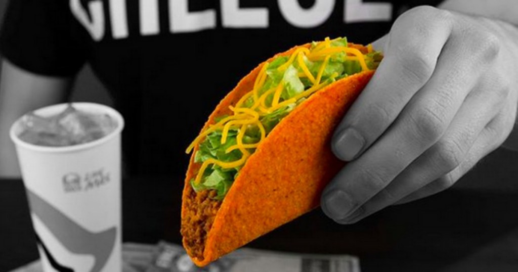 hand holding a taco