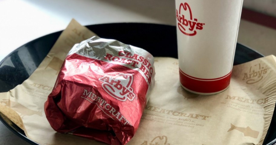 Arby's sandwich with drink on tray