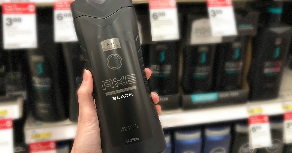 axe body wash black at target woman holding bottle