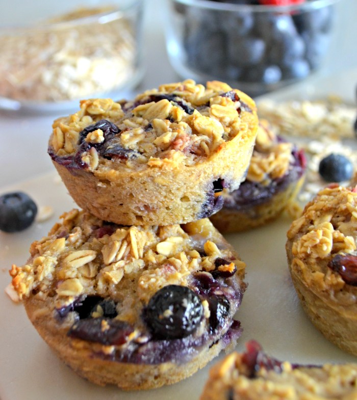 Baked Oatmeal Berry Cups – the finished muffins stacked on a plate