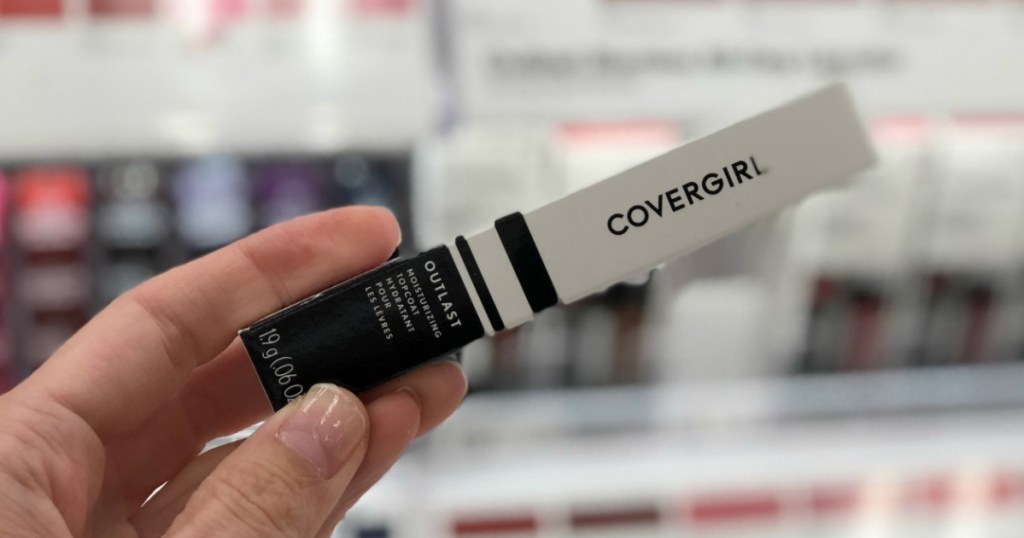 hand holding a CoverGirl outlast lip color