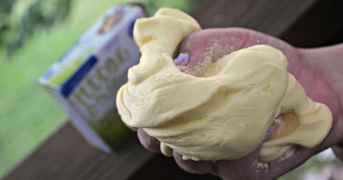 DIY play dough Pudding Slime - slime in a child's hand