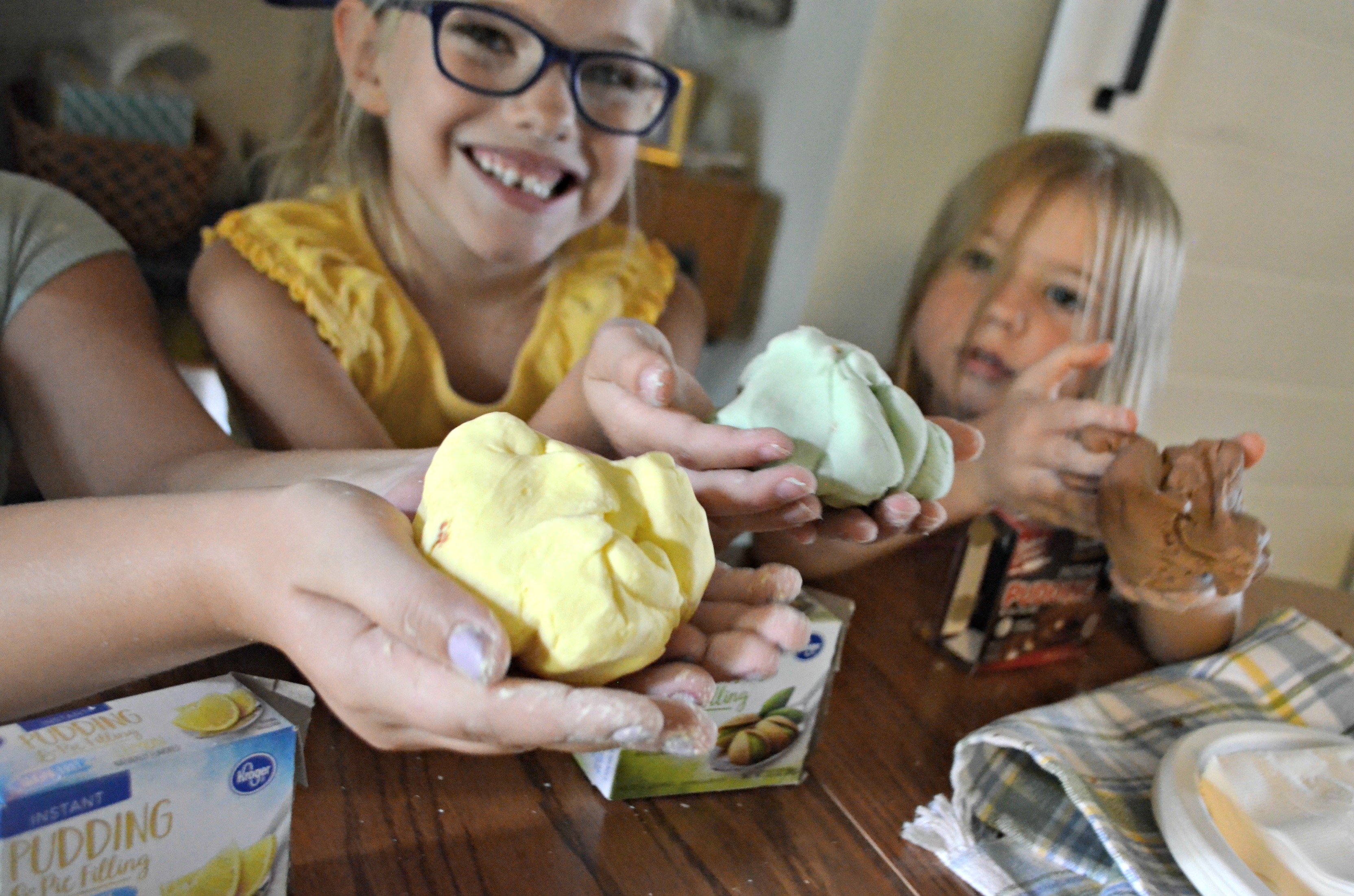 DIY play dough Pudding Slime – kids holding the slime in their hands