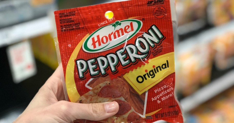 holding package of Hormel pepperoni