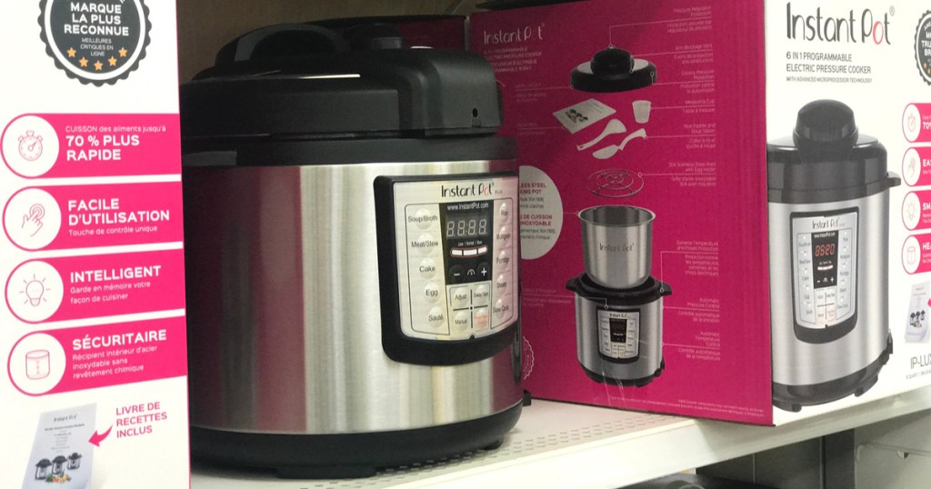 Pressure cooker LUX Instant Pot on store shelf between boxes